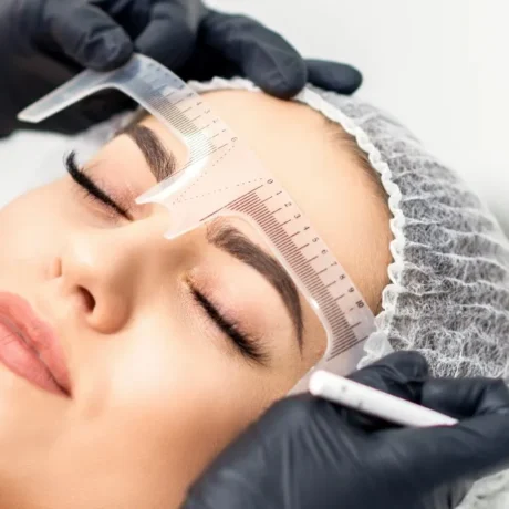 Eyebrow microblading safety procedure with professional eyebrow mapping before treatment